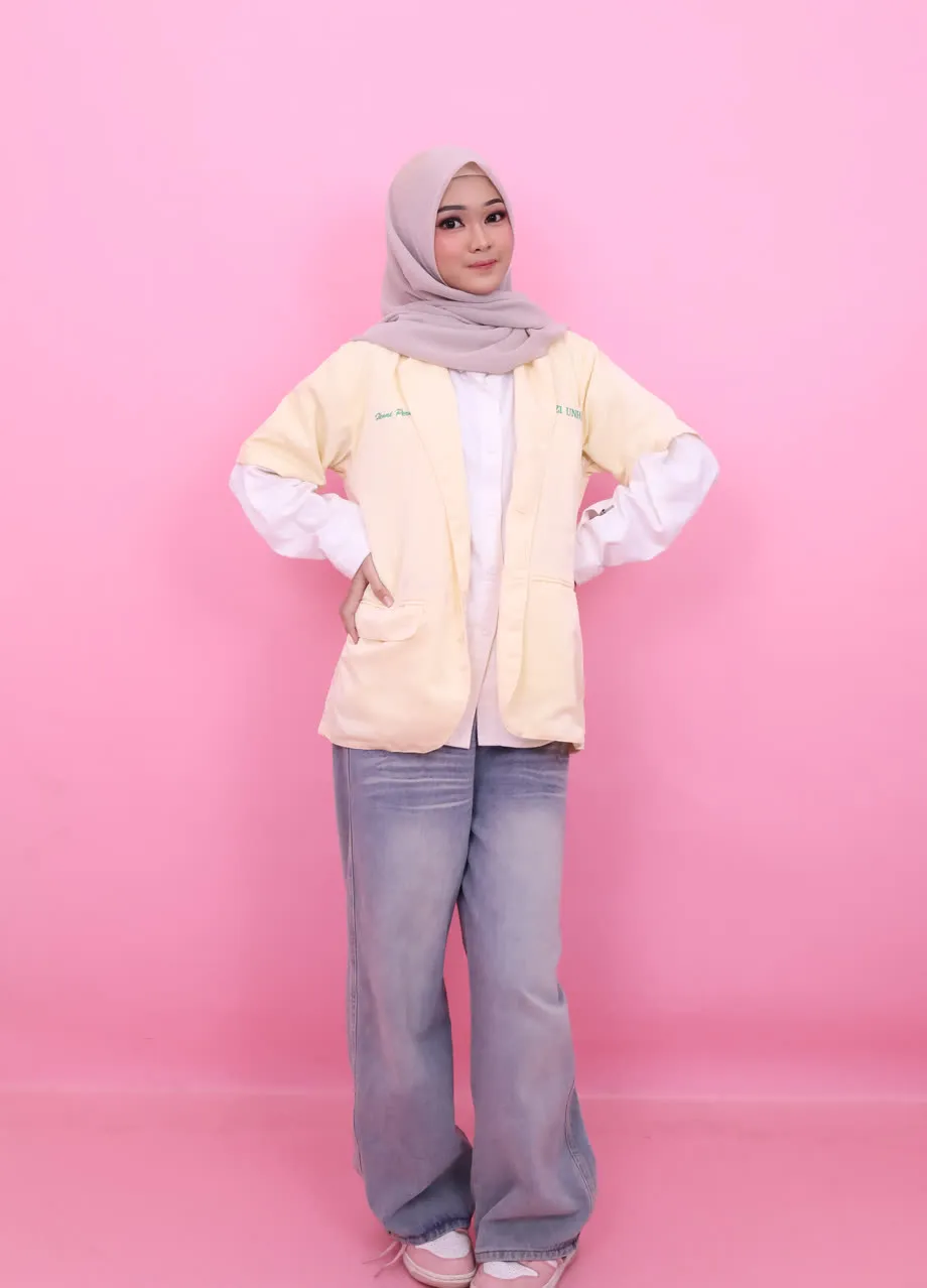 Henni Permata Sulis standing in a nutrition jacket